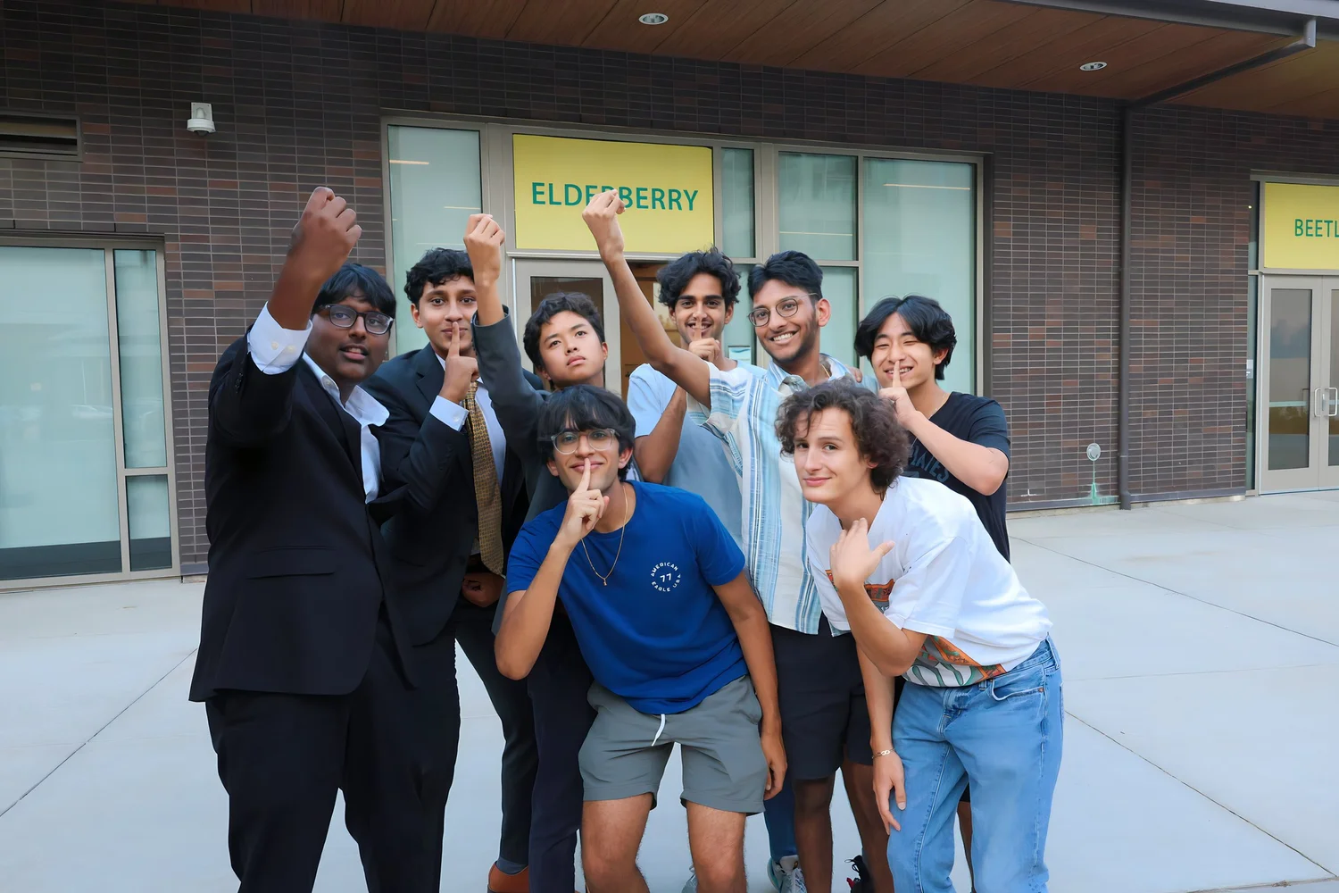 Campers posing outside the classroom